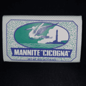 Vintage Mannite 'Cicogna' label with stork and lighthouse design.